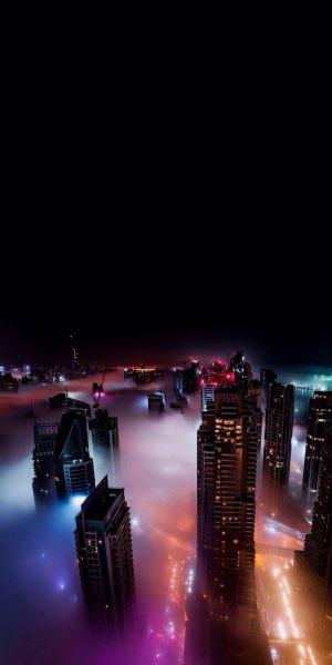 hình nền thành phố về đêm trên những tòa nhà chọc trời